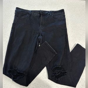 American Eagle Next Level Stretch Jegging with holes in the knees